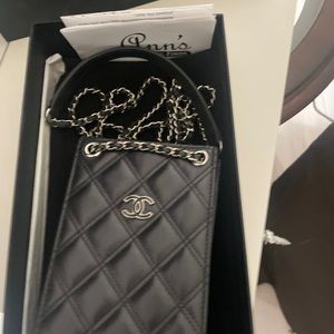 AuthenticChanel mini crossbody black lamb leather, few creases at bottom of bag
